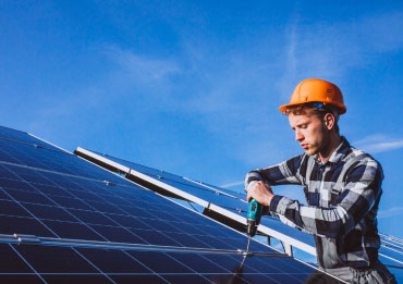 Installing rooftop solar panels on an eco build